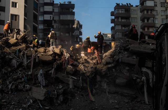 February 10, 2023, Adana, Turkey, Turkey: Hopes are dwindling but rescue workers continue to search for survivors on February 10, 2023 in Adana, Turkey, tirelessly sorting through the ruble after a 7.8 magnitude earthquake hit Turkey and Syria. Family members missing loved ones watch wordlessly hoping to find their loved ones alive but preparing for the worst as the country-wide death surpasses 20,000. Adana Turkey - ZUMAj167 20230210_zip_j167_002 Copyright: xSvetxJacquelinex