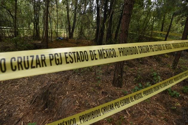 Clandestine grave found in forest in the State of Mexico with more than 60 bags of human remains, the second so far this year February 10, 2023 Lerma , Mexico : Aspects of the area where forensic experts from the State of Mexico conducted the proceedings where at least 9 clandestine graves were found in the forest on the border of the municipalities of Lerma and Ocoyoacac, unofficially have found a total of 68 packages with human remains, the area where these graves are still cordoned off to prevent the passage, where it is expected to continue working to locate more human remains. on February 10 , 2023 in Lerma, MÃ xico. (Photo by Arturo Hernandez Eyepix Group) Copyright: xArturoxHernandezx xEyepixxGroupx AH_100223_07