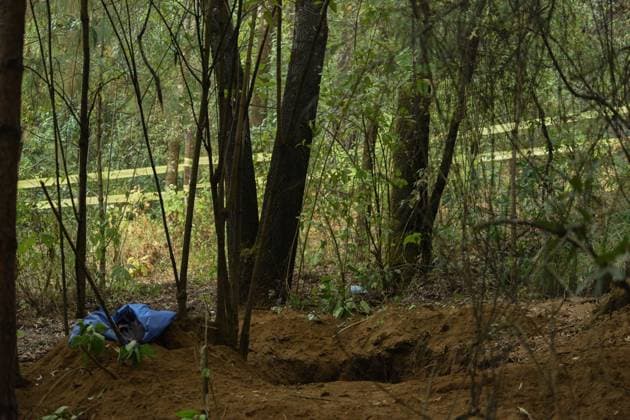 February 10, 2023 Lerma , Mexico : Aspects of the area where forensic experts from the State of Mexico conducted the proceedings where at least 9 clandestine graves were found in the forest on the border of the municipalities of Lerma and Ocoyoacac, unofficially have found a total of 68 packages with human remains, the area where these graves are still cordoned off to prevent the passage, where it is expected to continue working to locate more human remains. on February 10 , 2023 in Lerma, Mo xico. Lerma Mexico - ZUMAe321 20230211_zia_e321_008 Copyright: xArturoxHernandezx
