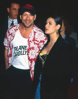 December 17, 1994, Orlando, Florida, USA: BRUCE WILLIS and DEMI MOORE on the red carpet at the grand opening of Planet Hollywood at Disney World. Orlando USA - ZUMAh235 20230209_zmp_h235_007 Copyright: xChristopherxHeltonx