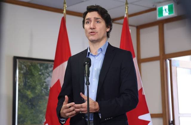 February 12, 2023, Ottawa, ON, Canada: Prime Minister Justin Trudeau speaks to the media Sunday, February 12, 2023, in Ottawa before boarding a flight to the Yukon after ordering the take down of an unidentified object that violated Canadian airspace. Ottawa Canada  - ZUMAc35_ 20230212_zaf_c35_006 Copyright: xPatrickxDoylex