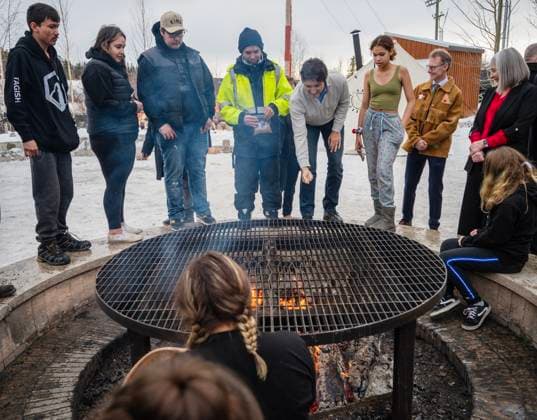February 12, 2023, Whitehorse, YT, CANADA: Prime Minister Justin Trudeau greets members of the crowd at the traditional fire pit during the Council of Yukon First Nations Together Today For Our Children Tomorrow 50th Anniversary celebrations at the Kwanlin DoÂ¼n Cultural Centre in Whitehorse, Yukon on Sunday February 12, 2023. Whitehorse CANADA  - ZUMAc35_ 20230212_zaf_c35_017 Copyright: xMikexThomasx