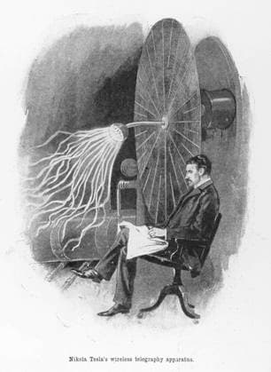 Nikola Tesla Nikola Tesla (1856-1943), Croatian inventor seated beside his wireless telegraphy apparatus Date: 1899  Copyright: Copyrightx(c)Geminix2023.xCredit:xGemini 12001599