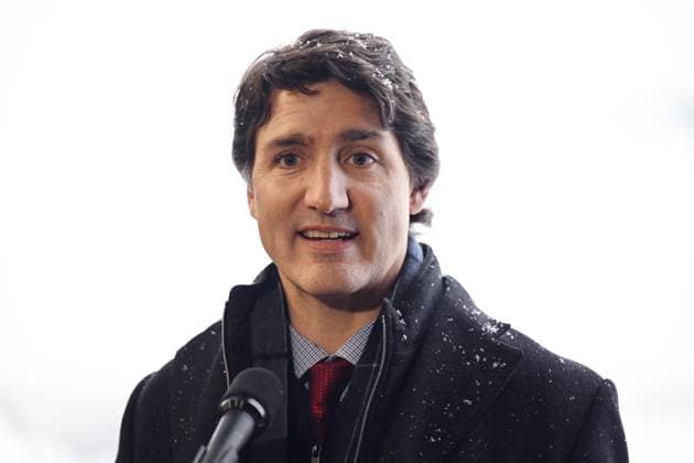 February 13, 2023, Whitehorse, YUKON, CANADA: Prime Minister Justin Trudeau speaks on the edge of the tarmac at Erik Nielsen International Airport during a press conference in Whitehorse, Yukon, on February 13, 2023. Whitehorse CANADA  - ZUMAc35_ 20230213_zaf_c35_073 Copyright: xMikexThomasx