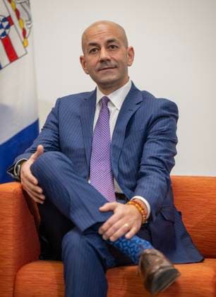 February 13, 2023, Whitehorse, YUKON, CANADA: Yukon Premier Ranj Pillai sits during a media availability with Prime Minister Justin Trudeau at the Yukonstruct building in Whitehorse, Yukon, on February 13, 2023. Whitehorse CANADA  - ZUMAc35_ 20230213_zaf_c35_081 Copyright: xMikexThomasx