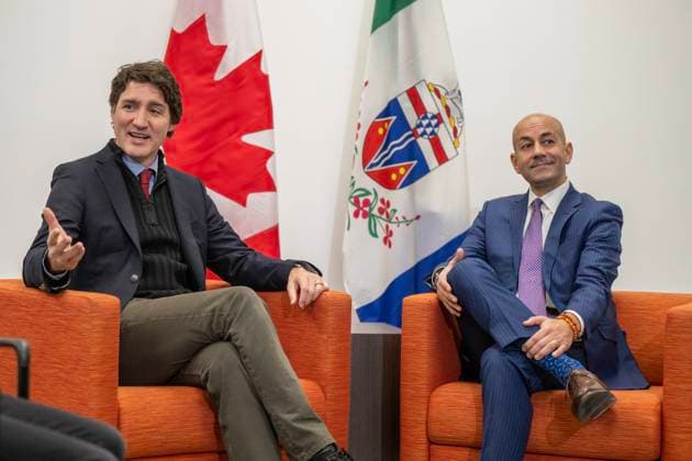 February 13, 2023, Whitehorse, YUKON, CANADA: Prime Minister Justin Trudeau, left, and Yukon Premier Ranj Pillai speak at the Yukonstruct building in Whitehorse, Yukon, on February 13, 2023. Whitehorse CANADA  - ZUMAc35_ 20230213_zaf_c35_082 Copyright: xMikexThomasx