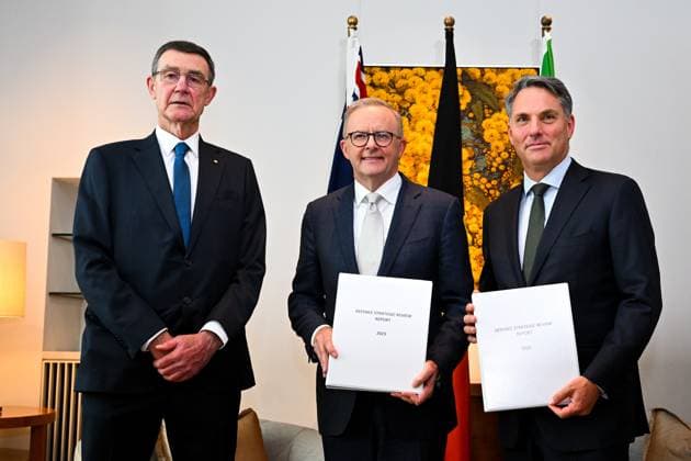 News Themen der Woche KW07 ANTHONY ALBANESE DEFENCE STRATEGIC REVIEW REPORT, Australian Prime Minister Anthony Albanese (centre) and Australian Deputy Prime Minister Richard Marles (right) receive the ?Defence Strategic Review Report 2023? from former Chief of the Australian Defence Force Sir Angus Houston during a meeting at Parliament House in Canberra, Tuesday, February 14, 2023. ( NO ARCHIVING, EDITORIAL USE ONLY, NO USE IN BOOKS WITHOUT CONSENT CANBERRA ACT AUSTRALIA  Copyright: xLUKASxCOCHx 20230214001763589994