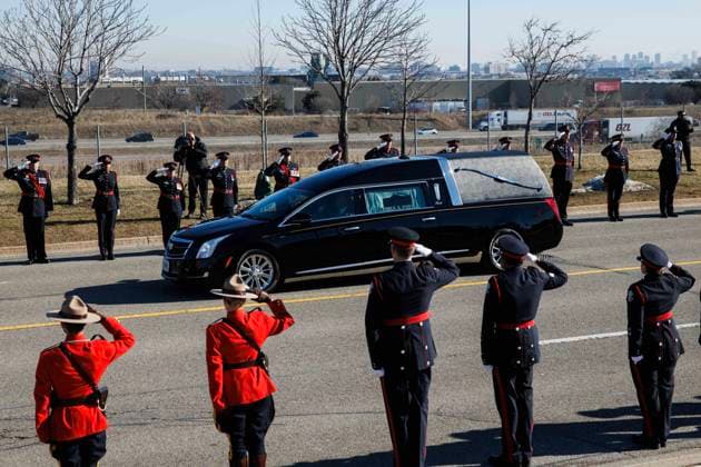 February 14, 2023, MISSISSAUGA, ON, CANADA: A hearse carrying the casket of former Mississauga mayor Hazel McCallion arrives at the Paramount Fine Foods Centre for her state funeral in Mississauga, Ont., Tuesday, Feb. 14, 2023. MISSISSAUGA CANADA  - ZUMAc35_ 20230214_zaf_c35_016 Copyright: xColexBurstonx