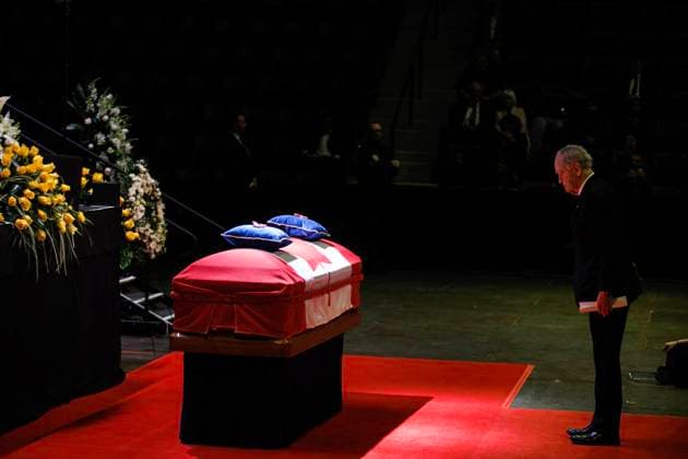 February 14, 2023, MISSISSAUGA, ON, CANADA: Jean Chro tien, former Prime Minister of Canada, stands at the foot of the casket of former Mississauga mayor Hazel McCallion during her state funeral in the Paramount Fine Foods Centre in Mississauga, Ontario, Tuesday, Feb. 14, 2023. MISSISSAUGA CANADA - ZUMAc35_ 20230214_zaf_c35_081 Copyright: xColexBurstonx