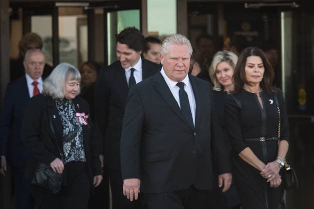 February 14, 2023, Mississauga, ONT, CANADA: Ontario Premier Doug Ford and dignitaries exit the Paramount Fine Foods Centre following the state funeral for former Mississauga mayor Hazel McCallion, in Mississauga, Ont., on Tuesday, February 14, 2023. Mississauga CANADA  - ZUMAc35_ 20230214_zaf_c35_089 Copyright: xTijanaxMartinx