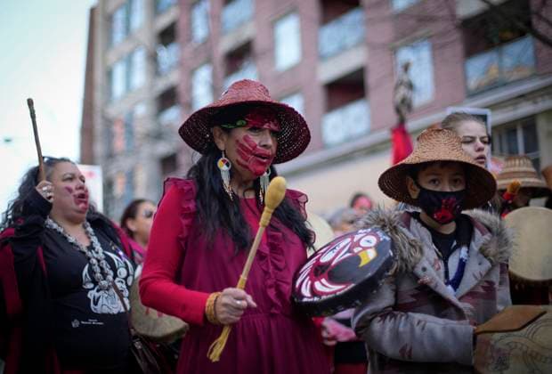 (230214) -- VANCOUVER, Feb. 14, 2023 -- People participate in the Women s Memorial March in Vancouver, British Columbia, Canada, on Feb. 14, 2023. Thousands of people participated in the march to commemorate the missing and murdered indigenous women and girls. (Photo by Xinhua) CANADA-VANCOUVER-WOMEN S MEMORIAL MARCH LiangxSen 