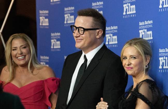 February 14, 2023, Santa Barbara, California, U.S: Brendan Fraser, star of The Whale, and his girlfriend Jeanne Moore on the left, Sarah Michelle Geller on the right, shines on the Red Carpet at the historic Arlington Theater on ValentineÃ¢â‚¬â ¢s Day, 2023, where Fraser is receiving the Santa Barbara International Film FestivalÃ¢â‚¬â ¢s prestigious American Riviera Award. Santa Barbara U.S. - ZUMAk144 20230214_znp_k144_016 Copyright: xAmyxKatzx