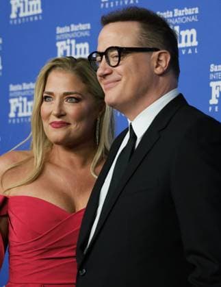 February 14, 2023, Santa Barbara, California, U.S: Brendan Fraser, star of The Whale, and his girlfriend Jeanne Moore on the left smiles on the Red Carpet at the historic Arlington Theater on ValentineÃ¢â‚¬â ¢s Day, 2023, where Fraser is receiving the Santa Barbara International Film FestivalÃ¢â‚¬â ¢s prestigious American Riviera Award. Santa Barbara U.S. - ZUMAk144 20230214_znp_k144_020 Copyright: xAmyxKatzx