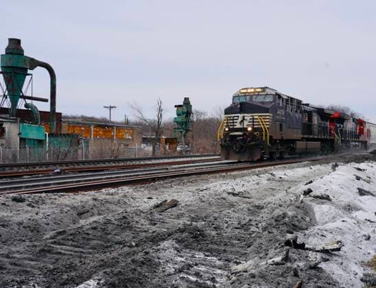 (230215) -- EAST PALESTINE (U.S.), Feb. 15, 2023 -- A Norfolk Southern freight train runs past the site of the Feb. 3 derailment on the outskirts of the village of East Palestine, Ohio, the United States, on Feb. 14, 2023. Residents in and around the village of East Palestine feared for their health and concerns have mounted about the environmental effect, after about 50 Norfolk Southern train cars, including 20 carrying hazardous materials, derailed on Feb. 3 on the outskirts of the village. (Photo by Xinhua) TO GO WITH Roundup: Ohio derailment leads to long-term environmental, health, legal concerns U.S.-OHIO-EAST PALESTINE-TRAIN-DERAILMENT PhilxZhang 
