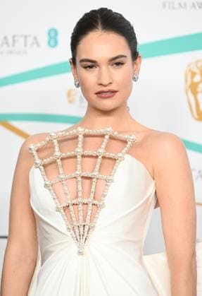 76th EE British Academy Film Awards (BAFTAs) at Royal Festival Hall - Arrivals Featuring: Lily James Where: London, United Kingdom When: 19 Feb 2023 Credit: Cover Images Copyright: xx 52458202 EDITORIAL USE ONLY. NOT FOR USE BY NEWSPAPERS BASED IN THE UK.
