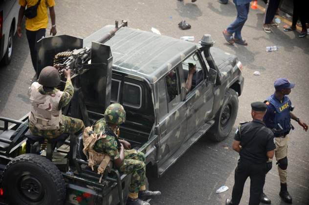 Tinubu, APC Presidential Candidate, Concludes Campaign In Lagos Military personnel in a vehicle as Asiwaju Bola Ahmed Tinubu, Presidential candidate, All Progressives Congress (APC) for 2023 Elections holds grand finale of his campaign at the Teslim Balogun Stadium in Surulere, Lagos on Tuesday, February 21, 2023. Photo by Adekunle Ajayi Lagos Nigeria  Copyright: xAdekunlexAjayix originalFilename: ajayi-notitle230221_npZZg.jpg