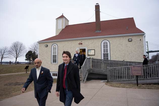 February 23, 2023, Halifax, NS, Canada: Prime Minister Justin Trudeau, right, walks with Percy Paris after touring the Africville museum in Halifax on Thursday, February 23, 2023. Halifax Canada  - ZUMAc35_ 20230223_zaf_c35_053 Copyright: xDarrenxCalabresex
