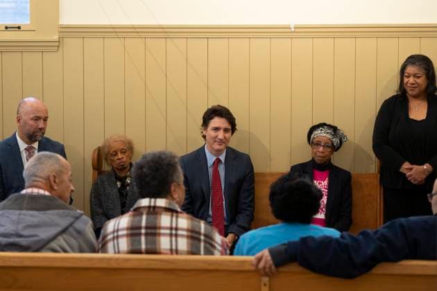 February 23, 2023, Halifax, NS, Canada: Prime Minister Justin Trudeau, centre, meets with community members at the Africville museum in Halifax on Thursday, February 23, 2023. Halifax Canada  - ZUMAc35_ 20230223_zaf_c35_055 Copyright: xDarrenxCalabresex