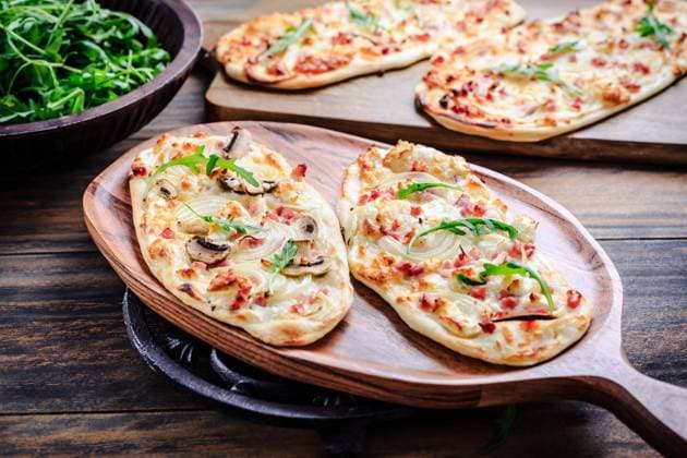 French tarte flambee with cream cheese, bacon and onions. Flammkuchen from Alsace region French tarte flambee with cream cheese, bacon and onions. Flammkuchen from Alsace region Copyright: xZoonar.com IngridxBalabanovax 19381339
