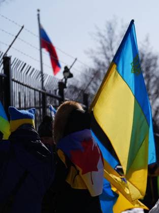 February 24, 2023, Ottawa, Ontario, Canada: People demonstrate against the war in the Ukraine in front of the Russian embassy in Ottawa on Friday, Feb. 24, 2023. Ottawa Canada  - ZUMAc35_ 20230224_zaf_c35_025 Copyright: xSeanxKilpatrickx