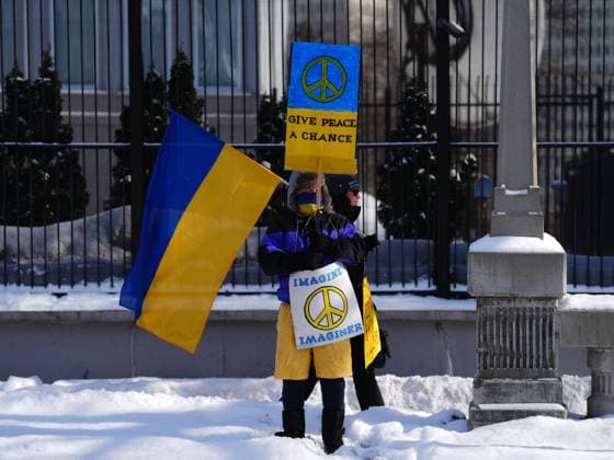 February 24, 2023, Ottawa, Ontario, Canada: People demonstrate against the war in the Ukraine in front of the Russian embassy in Ottawa on Friday, Feb. 24, 2023. Ottawa Canada  - ZUMAc35_ 20230224_zaf_c35_026 Copyright: xSeanxKilpatrickx