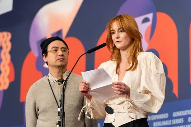 25 02 2023,Berlin,Germany,73 Berlin International Film Festival Director Amr Gamal is awarded the Amnesty Film Prize for his film Al Murhaqoon by Amnesty Jury Members Lea van Acken, Burhan Qurbani and Markus N Beeko.