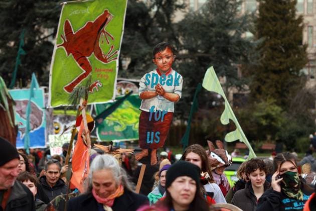 February 25, 2023, VICTORIA, BC, CAN: People march during a rally against the destruction of old growth forests towards the front lawn of the legislature in Victoria, B.C., on Saturday, February 25, 2023. VICTORIA CAN  - ZUMAc35_ 20230225_zaf_c35_027 Copyright: xChadxHipolitox