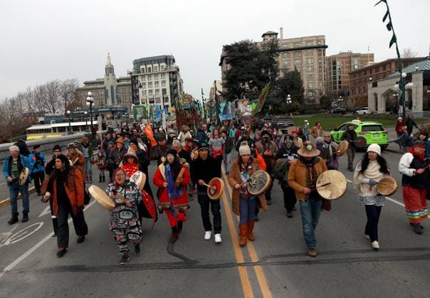 February 25, 2023, VICTORIA, BC, CAN: People march during a rally against the destruction of old growth forests towards the front lawn of the legislature in Victoria, B.C., on Saturday, February 25, 2023. VICTORIA CAN  - ZUMAc35_ 20230225_zaf_c35_028 Copyright: xChadxHipolitox