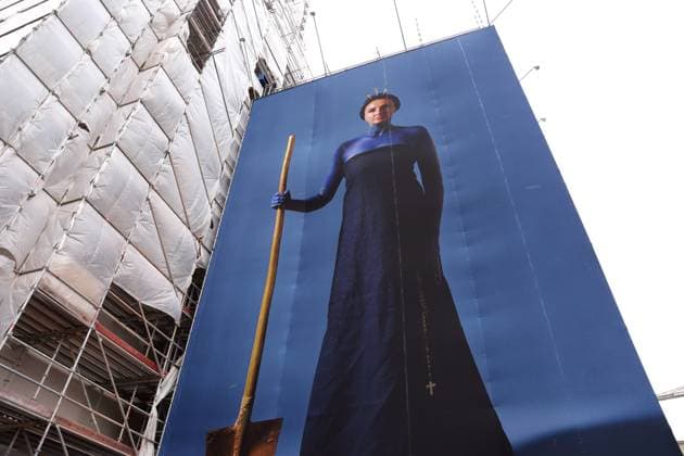 Portrait photos of Ukrainian refugee women by artist Julia Krahn hang in the exhibition St Javelin at the construction site for the reconstruction of the tower of the Garrison Church in Potsdam, 25 February 2023 The exhibition runs until 9 April 2023 Construction Site Garrison Church Potsdam Exhibition St Javelin