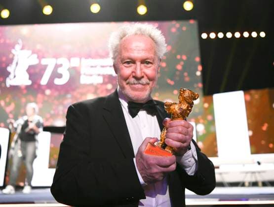 (230226) -- BERLIN, Feb. 26, 2023 -- Nicolas Philibert, director of the film On the Adamant , poses for photos after receiving the Golden Bear for Best Film during the 73rd Berlin International Film Festival in Berlin, Germany, Feb. 25, 2023. ) GERMANY-BERLIN-BERLINALE 2023-AWARDS RenxPengfei 