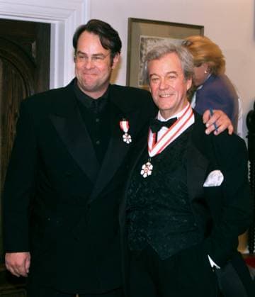 April 14, 1999, OTTAWA, ON, Canada: Actor Dan Aykroyd puts his arm around fellow Canadian actor Gordon Pinsent following an Investiture ceremony into the Order of Canada in Ottawa, Wednesday April 14, 1999.Tributes are pouring in for beloved Canadian actor Pinsent, with friends and fans recalling his playful humour and creative spirit. The Newfoundand native and award-winning star of the film öÄuAway From Her died Saturday evening at age 92. OTTAWA Canada  - ZUMAc35_ 19990414_zaf_c35_001 Copyright: xTomxHansonx
