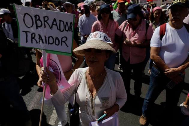March For Democracy In Mexico A person is holding a banner during a march called March for Democracy, INE is not touched , which started from the Angel of Independence and is ending at the Zocalo in Mexico City, where several people are demonstrating in rejection of the proposed Electoral Reform presented by the President of Mexico, Andres Manuel Lopez Obrador, which proposes cutting the budget of political parties, electing legislators in a system of electoral lists and that the selection of the electoral councillors of the National Electoral Institute (INE) and the magistrates of the Electoral Tribunal be made by direct vote of the citizens. Mexico City Mexico  Copyright: xGerardoxVieyrax originalFilename: vieyra-notitle230226_npdsP.jpg