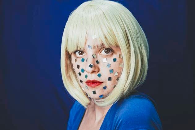 Woman with small mirrors on face against colored background model released, Symbolfoto, SVCF00312