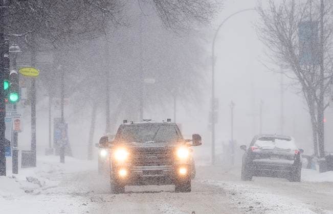 February 28, 2023, Montreal, PQ, Canada: Motorists make their way along a street during a snowstorm in Montreal, Tuesday, Feb. 28, 2023. Montreal Canada  - ZUMAc35_ 20230228_zaf_c35_005 Copyright: xGrahamxHughesx