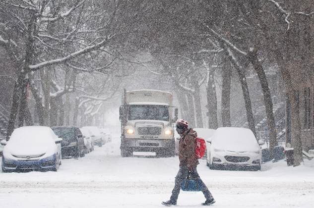 February 28, 2023, Montreal, PQ, Canada: A man walks along a street during a snowstorm in Montreal, Tuesday, Feb. 28, 2023. Montreal Canada  - ZUMAc35_ 20230228_zaf_c35_007 Copyright: xGrahamxHughesx
