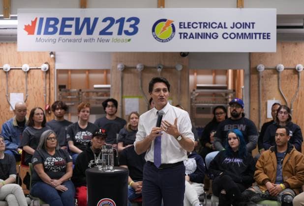 March 1, 2023, PORT COQUITLAM, BC, CANADA: Prime Minister Justin Trudeau responds to a question during a town hall with electrician apprentices at the Electrical Joint Training Committee facility in Port Coquitlam, B.C., on Wednesday, March 1, 2023. PORT COQUITLAM CANADA  - ZUMAc35_ 20230301_zaf_c35_042 Copyright: xDarrylxDyckx