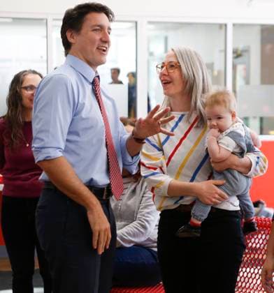 March 3, 2023, WINNIPEG, MANITOBA, CANADA: Prime Minister Justin Trudeau talks to Therea Young Kuzina and other parents at the YMWCA daycare in Winnipeg, Friday, March 3, 2023. Trudeau said Manitoba will achieve an average of $10-a-day child care by April 2, three years ahead of schedule for the Liberal government s target for its national plan. WINNIPEG CANADA  - ZUMAc35_ 20230303_zaf_c35_039 Copyright: xJohnxWoodsx