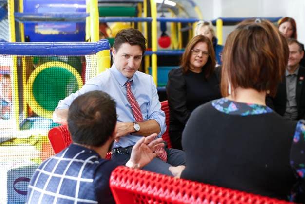 March 3, 2023, WINNIPEG, MANITOBA, CANADA: Prime Minister Justin Trudeau talks to parents at the YMWCA daycare in Winnipeg, Friday, March 3, 2023. Trudeau said Manitoba will achieve an average of $10-a-day child care by April 2, three years ahead of schedule for the Liberal government s target for its national plan. WINNIPEG CANADA  - ZUMAc35_ 20230303_zaf_c35_046 Copyright: xJohnxWoodsx