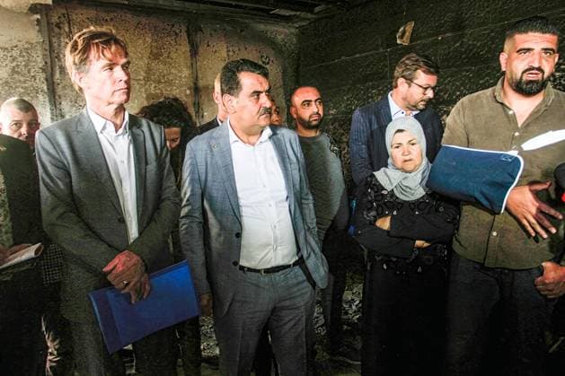 March 3, 2023, Nablus, West Bank, Palestine: Sven Kuhn von Burgsdorff, the European Union representative for the Palestinian Territories, center, surveys the damage of a torched house in the West Bank town of Hawara which was set ablaze by radical Jewish settlers earlier this week . On Monday scores of Israeli settlers went on a violent rampage in the northern West Bank town of Hawara, setting cars and homes on fire after two settlers were killed by a Palestinian gunman. Nablus Palestine - ZUMAs197 20230303_zaa_s197_292 Copyright: xNasserxIshtayehx