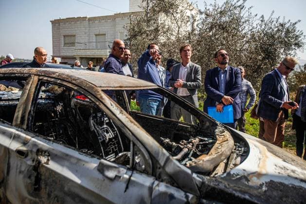March 3, 2023, Nablus, West Bank, Palestine: Sven Kuhn von Burgsdorff, the European Union representative for the Palestinian Territories, center, survey the damage of a burnt car in the West Bank town of Hawara which was set ablaze by radical Jewish settlers earlier this week . On Monday scores of Israeli settlers went on a violent rampage in the northern West Bank town of Hawara, setting cars and homes on fire after two settlers were killed by a Palestinian gunman. Nablus Palestine - ZUMAs197 20230303_zaa_s197_312 Copyright: xNasserxIshtayehx