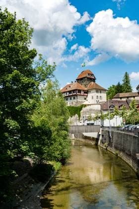 view of the historic half-timbered medieval castle and Murg river in the city of Frauenfeld Frauenfeld, TG Switzerland - 14. July 2019: view of the historic half-timbered medieval castle and Murg river in the city of Frauenfeld Copyright: xZoonar.com NandoxLardix 14100731