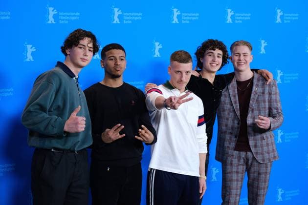 Script writer Felix Lobrecht, actors Aaron Maldonado Morales, Rafael Luis Klein Heßling, Vincent Wiemer and Levy Rico Arcos during the photocall for the film Sonne und Beton on the occasion of the 73rd Berlin International Film Festival snaps