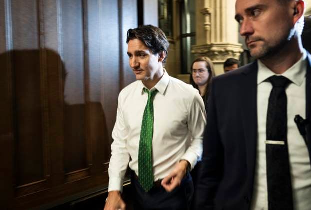 March 8, 2023, Ottawa, ON, CAN: Prime Minister Justin Trudeau heads into a meeting of the Liberal caucus after speaking to reporters, on Parliament Hill in Ottawa, on Wednesday, March 8, 2023. Ottawa CAN  - ZUMAc35_ 20230308_zaf_c35_025 Copyright: xJustinxTangx