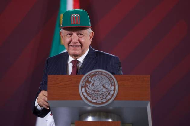 Mexican President, Lopez Obrador News Conference March 10, 2023, Mexico City, Mexico: Mexico™s President, Andres Manuel Lopez Obrador, puts on a cap of Mexican baseball team during the briefing conference at National Palace. on March 10, 2023 in Mexico City, Mexico. (Photo by Julian Lopez Eyepix Group) Copyright: xJulianxLopez xEyepixxGroupx JL_10032023_89428