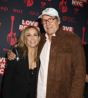 March 9, 2023, New York City, New York, USA: Comedian musician CHEVY CHASE and singer SHERYL CROW seen during the red carpet arrivals for the Seventh Annual Love Rocks NYC Benefit Concert for GodÃ¢â‚¬â ¢s Love We Deliver held at the Beacon Theater. New York City USA - ZUMAk03_ 20230309_zaf_k03_029 Copyright: xNancyxKaszermanx