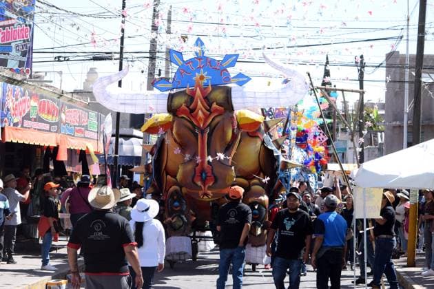 Monumental Cardboard Exhibition During International Fireworks Fair 08 March 2023, Tultepec, Mexico: Persons attend at monumental cardboard figures exhibition as part of the International Fireworks Fair 2023 (IFF), festival in honor of Saint John of God, saint of fireworks. The bulls are paper mache and cardboard. Since morning they parade through the streets and compete for the bull with the best design. on March 12, 2023 in Tultepec, Mexico. (Photo: Francisco Morales Eyepix Group) Copyright: xFranciscoxMorales xEyepixxGroupx DM_9002_FM_6450