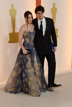 (L-R) Caroline Lindy and Daniel Roher attend the 95th annual Academy Awards at the Dolby Theatre in the Hollywood section of Los Angeles on Sunday, March 12, 2023.  LAP2023031267 JIMxRUYMEN