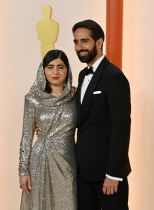 (L-R) Malala Yousafzai and Asser Malik attend the 95th annual Academy Awards at the Dolby Theatre in the Hollywood section of Los Angeles on Sunday, March 12, 2023.  LAP2023031281 JIMxRUYMEN