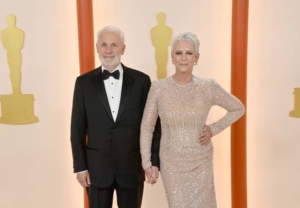 (L-R) Christopher Guest and Jamie Lee Curtis attend the 95th annual Academy Awards at the Dolby Theatre in the Hollywood section of Los Angeles on Sunday, March 12, 2023.  LAP2023031211086 JIMxRUYMEN