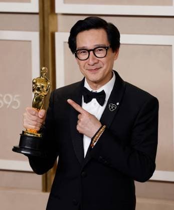 Ke Huy Quan winner of the award for Best Supporting Actor, for Everything Everywhere All at Once appears backstage with her Oscar during the 95th annual Academy Awards at Loews Hollywood Hotel in the Hollywood section of Los Angeles on Sunday, March 12, 2023.  LAP20230312177 JOHNxANGELILLO